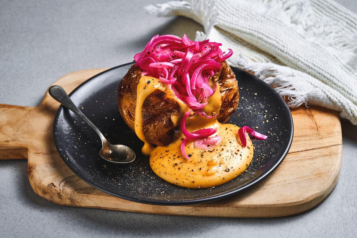 Baked Potato with Cheddar Sauce